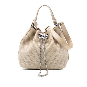 Pre-Loved Chanel Small Chevron Calfskin Stud Wars Drawstring Bucket Bag